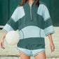 Gestreepte tweedelige set voor dames: top met halve rits en shorts