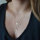 Elegante meerlaagse ketting met een sierlijke hanger
