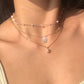 Elegante meerlaagse ketting met een sierlijke hanger