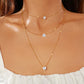 Elegante meerlaagse ketting met een sierlijke hanger