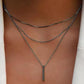 Elegante meerlaagse ketting met een sierlijke hanger