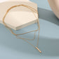 Elegante meerlaagse ketting met een sierlijke hanger