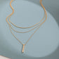 Elegante meerlaagse ketting met een sierlijke hanger